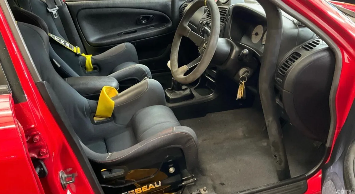 Mitsubishi Lancer Saloon, Petrol, 1996, Red