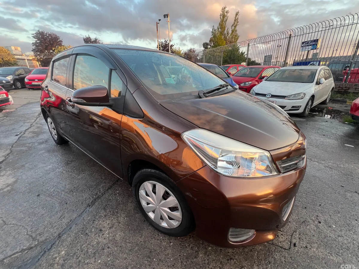 Toyota Vitz Hatchback, Petrol, 2014, Brown
