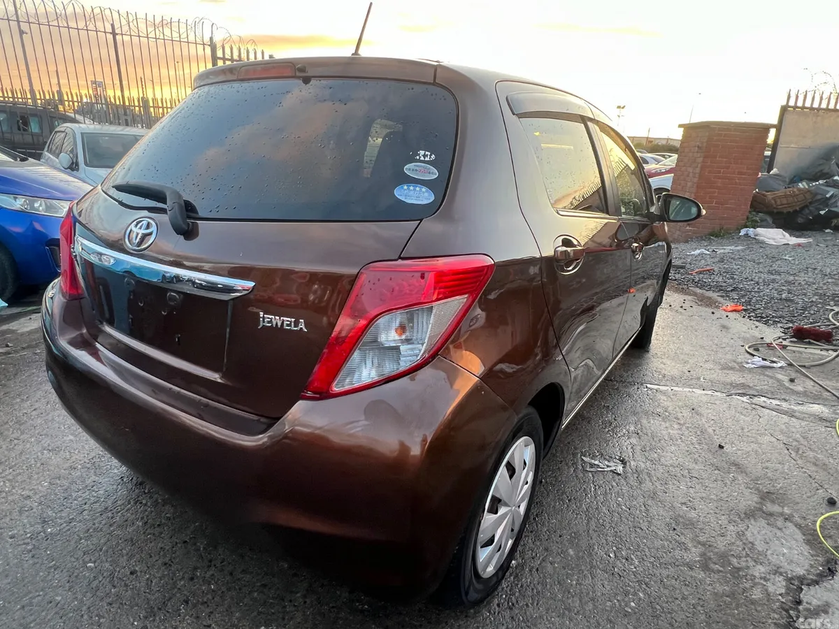 Toyota Vitz Hatchback, Petrol, 2014, Brown
