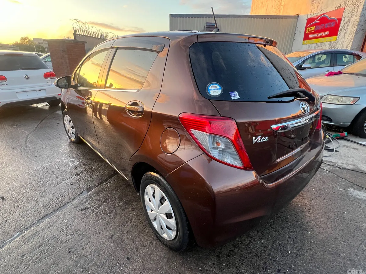 Toyota Vitz Hatchback, Petrol, 2014, Brown