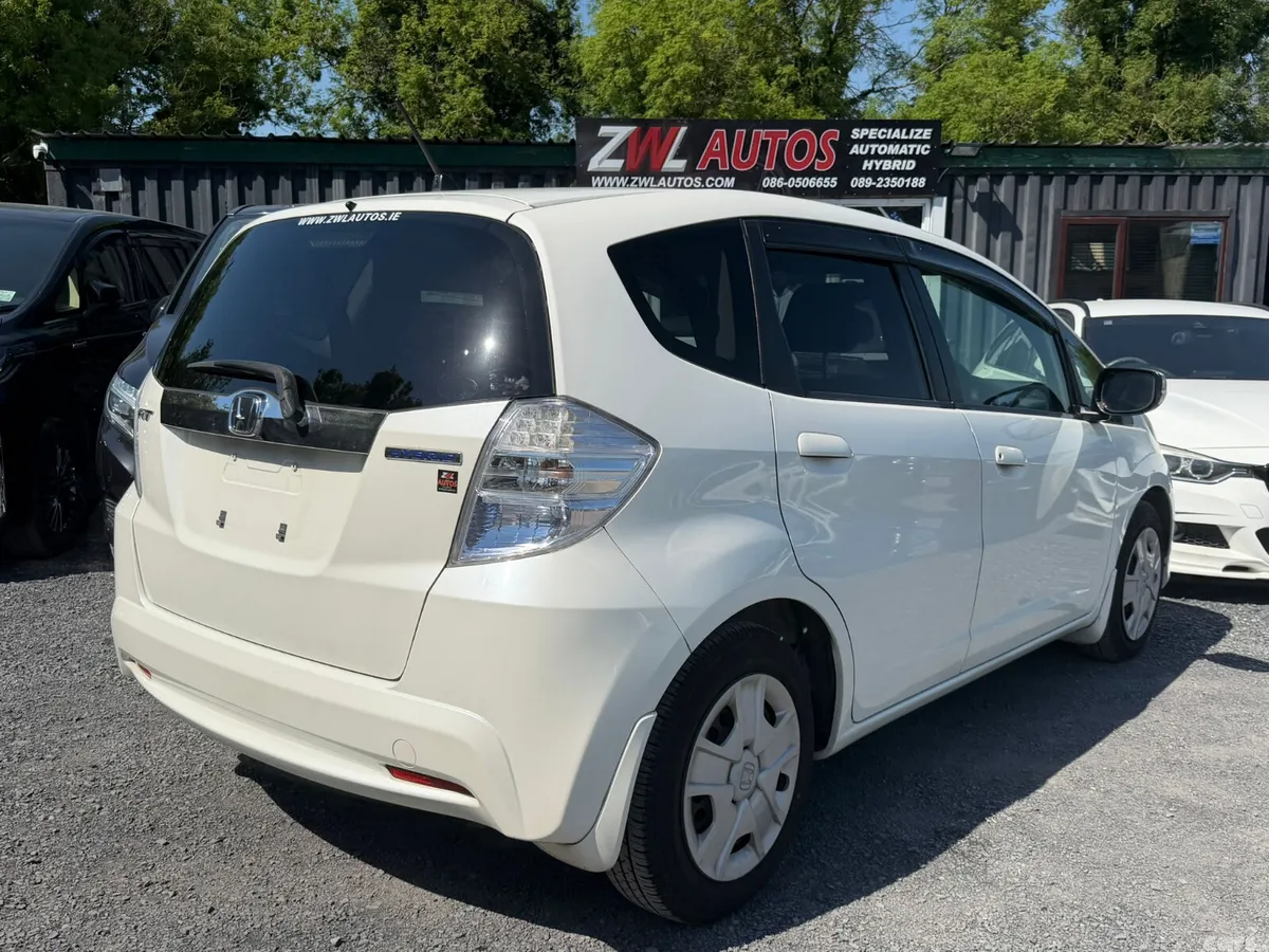 Honda Fit Hatchback, Petrol Hybrid, 2011, White
