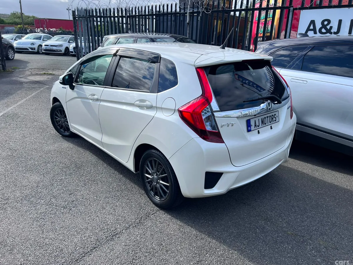 Honda Fit Hatchback, Petrol Hybrid, 2016, White