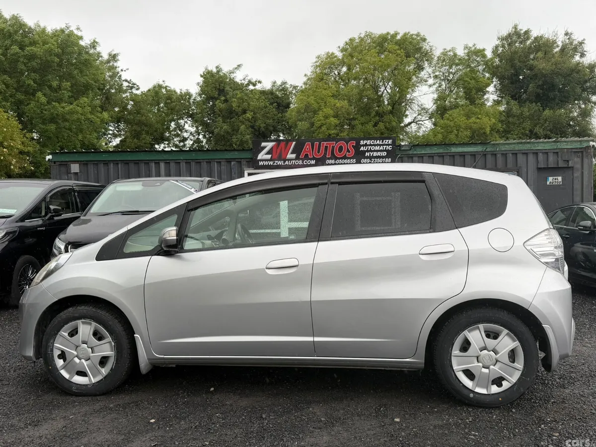 Honda Fit Hatchback, Petrol Hybrid, 2011, White