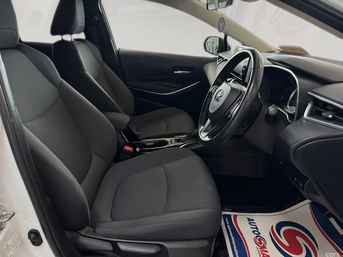 Toyota Corolla Estate, Petrol Hybrid, 2022, White