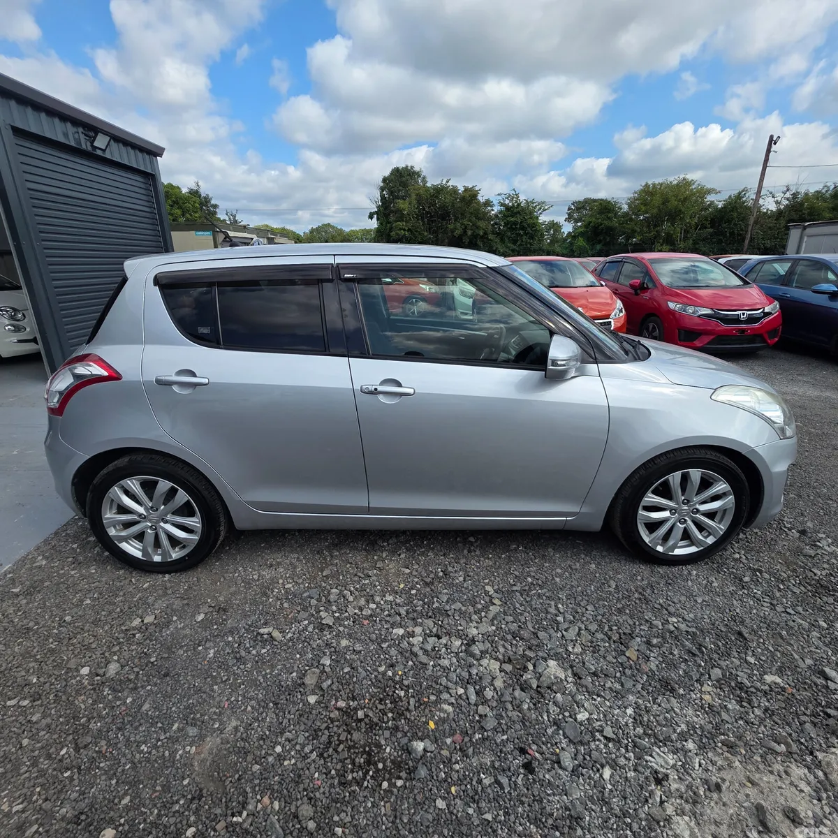 Suzuki Swift Hatchback, Petrol, 2015, Silver