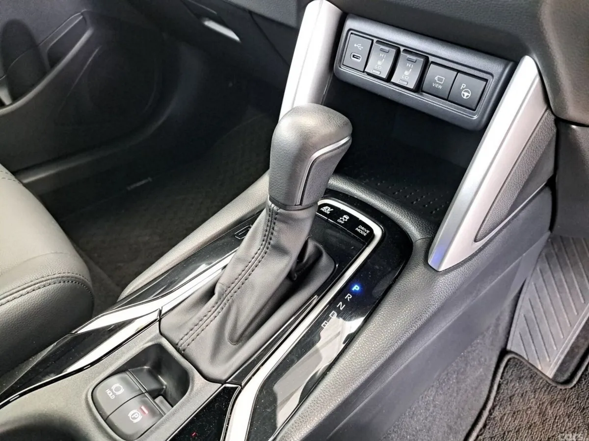 Toyota Corolla Cross SUV, Petrol Hybrid, 2024, White