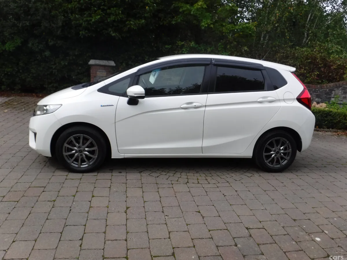 Honda Fit Hatchback, Petrol Hybrid, 2015, White