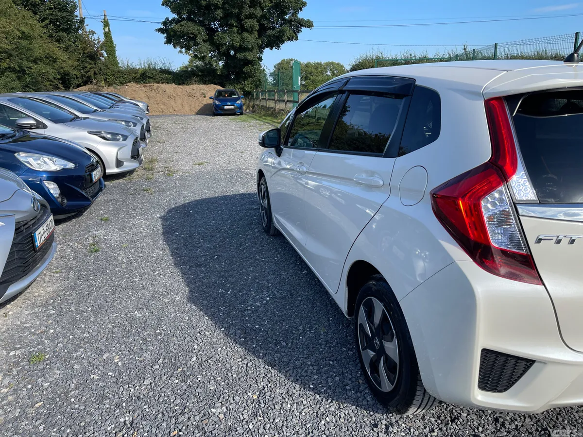 Honda Fit Hatchback, Petrol Hybrid, 2016, White