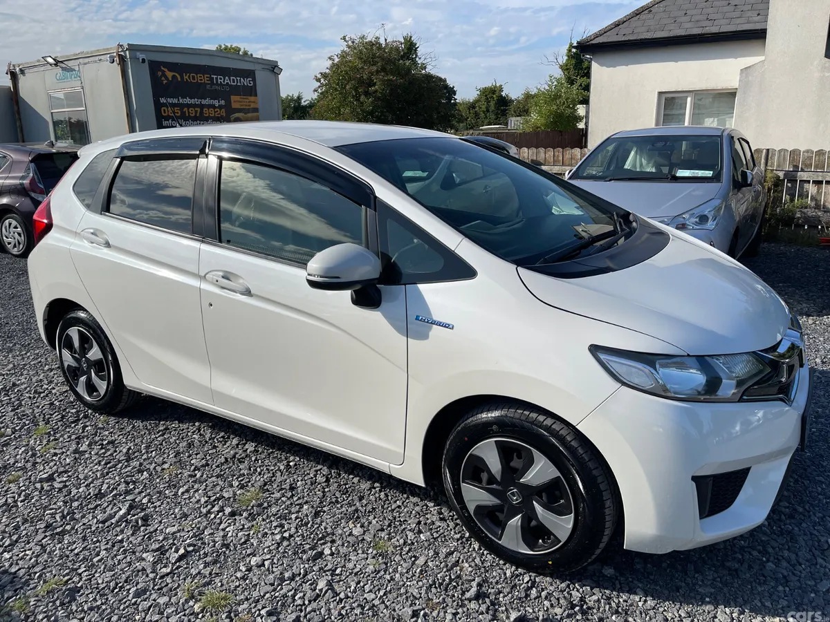 Honda Fit Hatchback, Petrol Hybrid, 2016, White