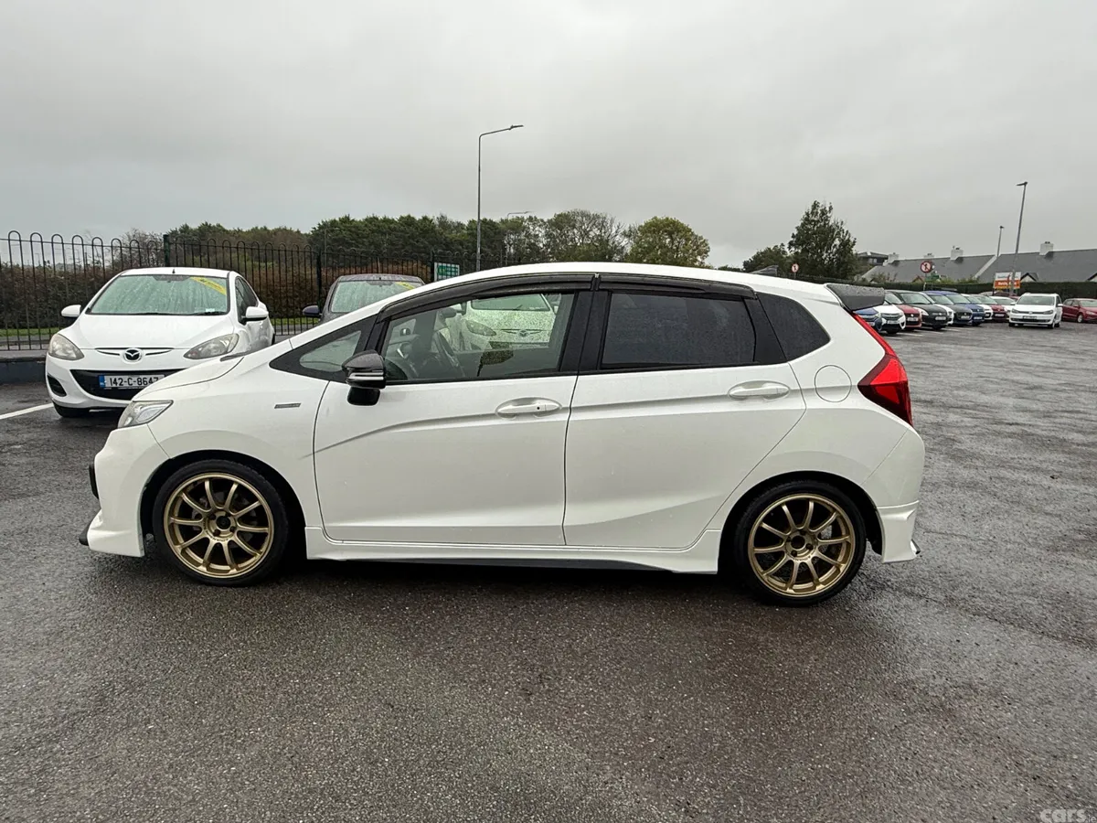 Honda Fit Hatchback, Petrol Hybrid, 2016, White