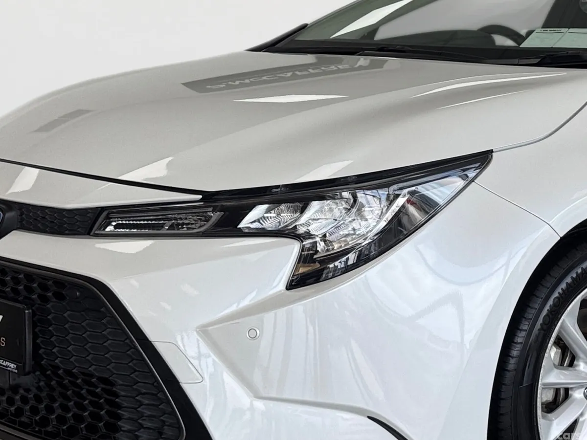 Toyota Corolla Estate, Petrol Hybrid, 2022, White