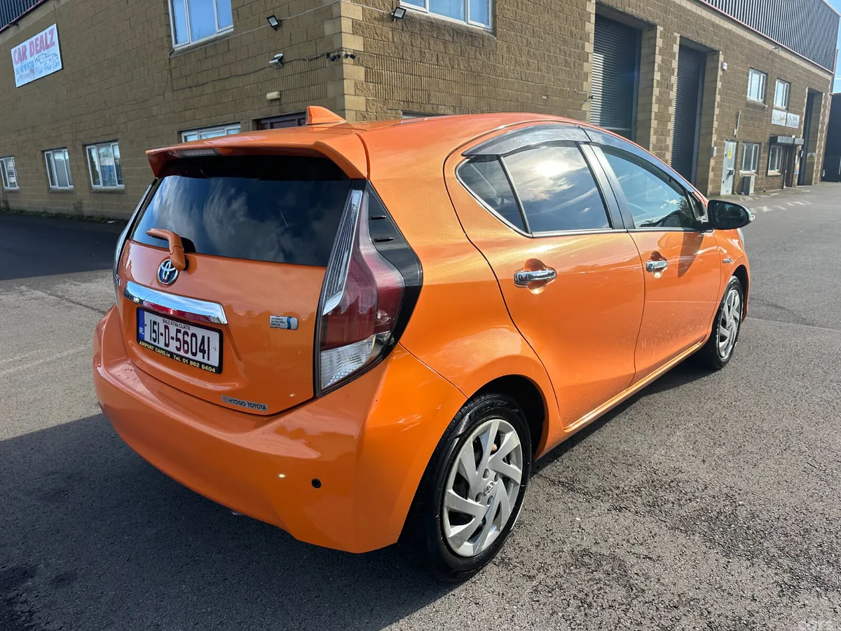 Toyota Aqua Hatchback, Petrol Hybrid, 2015, Orange