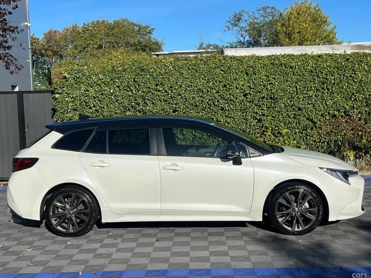 Toyota Corolla Estate, Petrol Hybrid, 2021, White