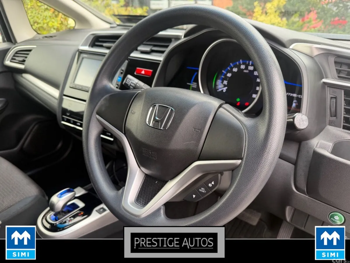 Honda Fit Hatchback, Petrol Hybrid, 2015, White