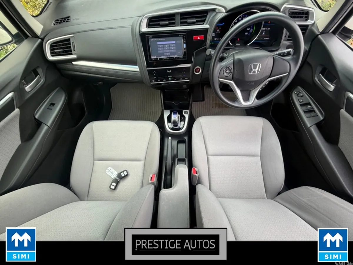Honda Fit Hatchback, Petrol Hybrid, 2015, White