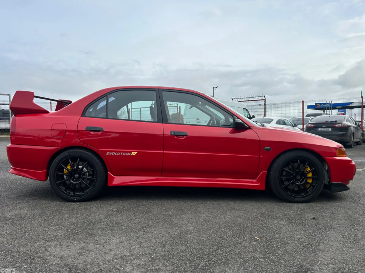 Mitsubishi Lancer Saloon, Petrol, 1996, Red