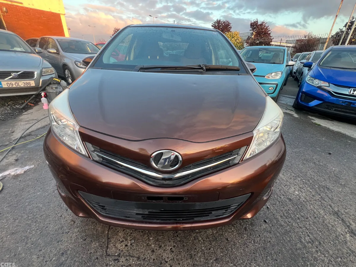 Toyota Vitz Hatchback, Petrol, 2014, Brown