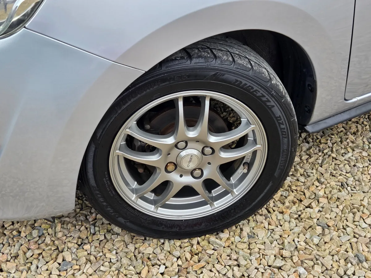 Mitsubishi Mirage Hatchback, Petrol, 2012, Silver