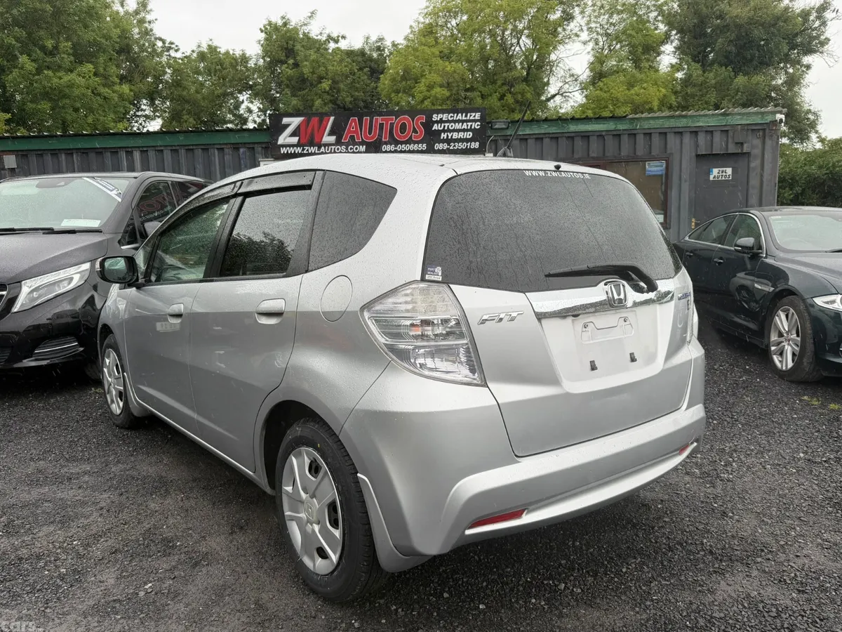 Honda Fit Hatchback, Petrol Hybrid, 2011, White