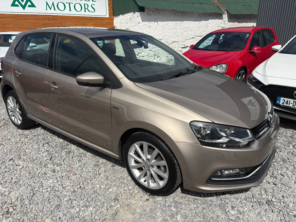 Volkswagen Polo Hatchback, Petrol, 2017, Gold