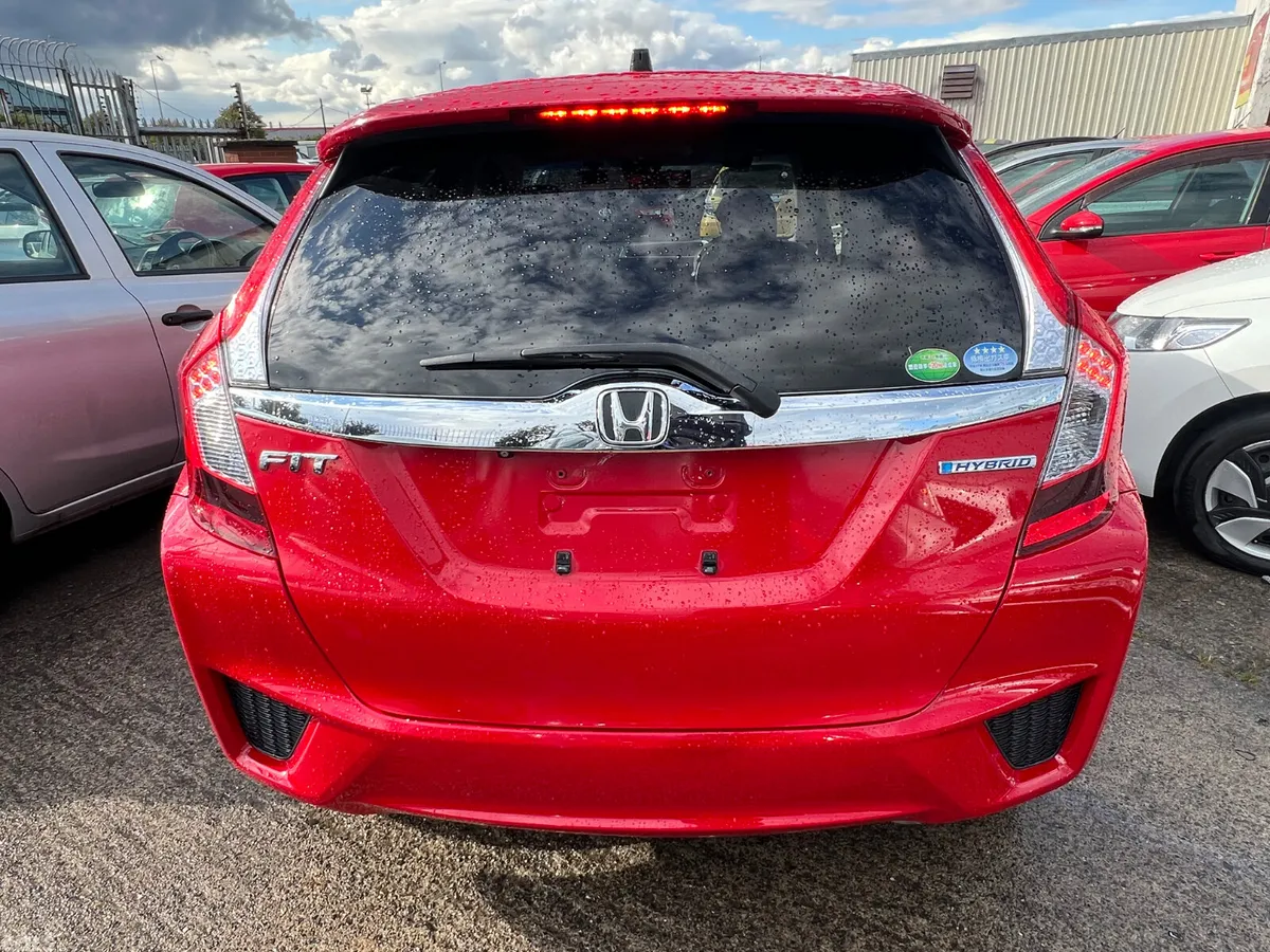 Honda Fit Hatchback, Petrol Hybrid, 2015, Red