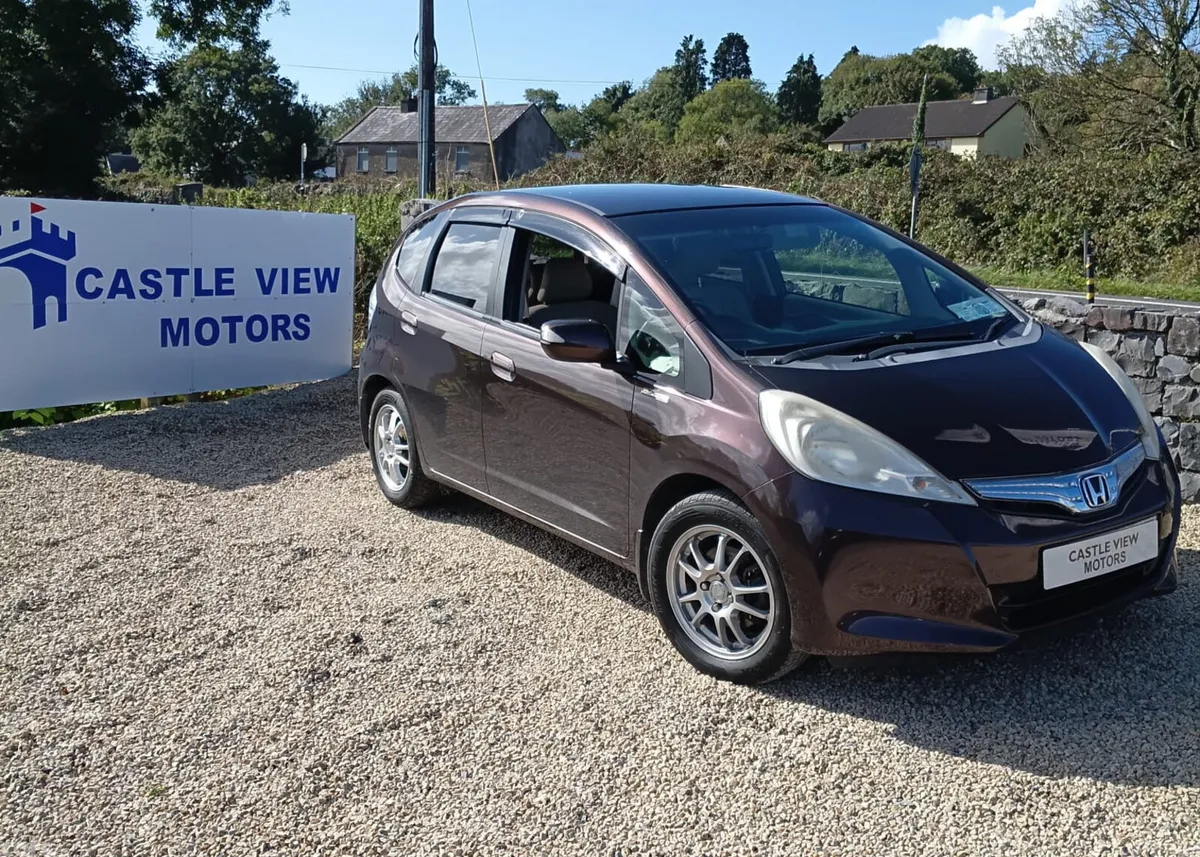 Honda Fit Hatchback, Petrol Hybrid, 2012, Red