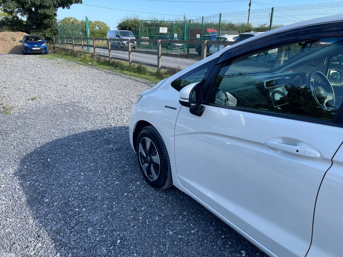 Honda Fit Hatchback, Petrol Hybrid, 2016, White