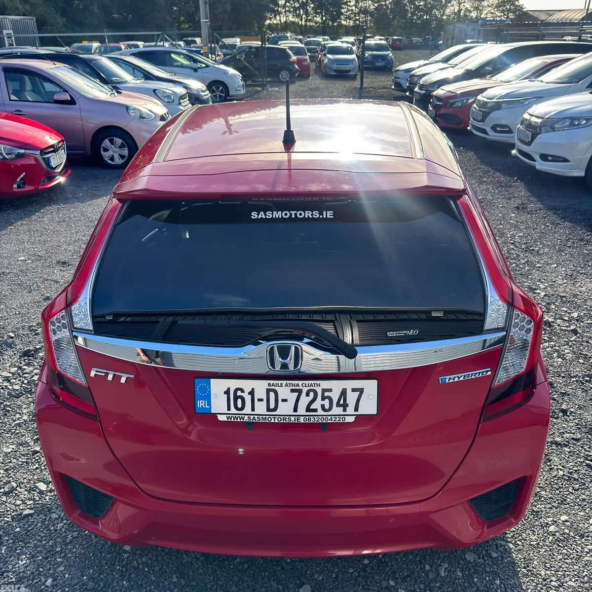 Honda Fit Hatchback, Petrol Hybrid, 2016, Red