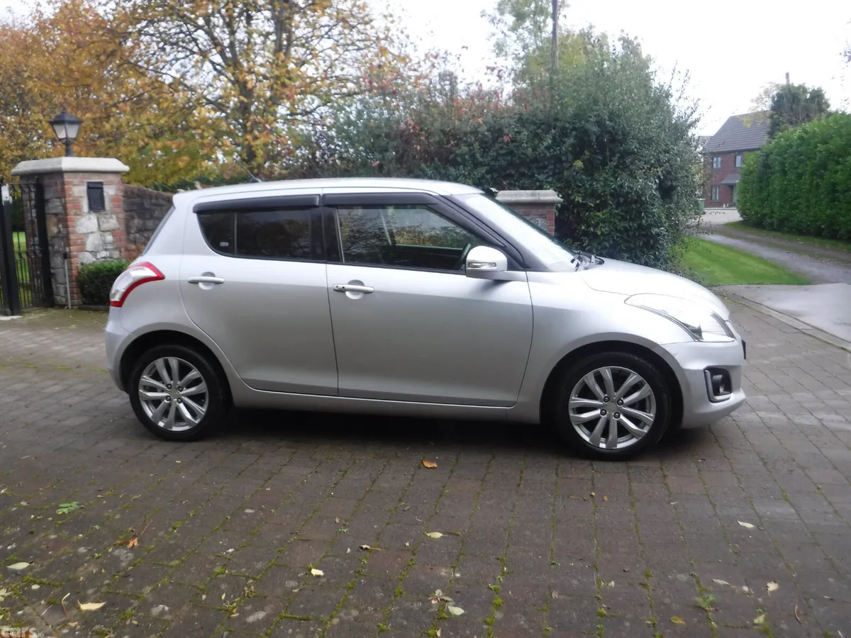 Suzuki Swift Hatchback, Petrol, 2015, Silver