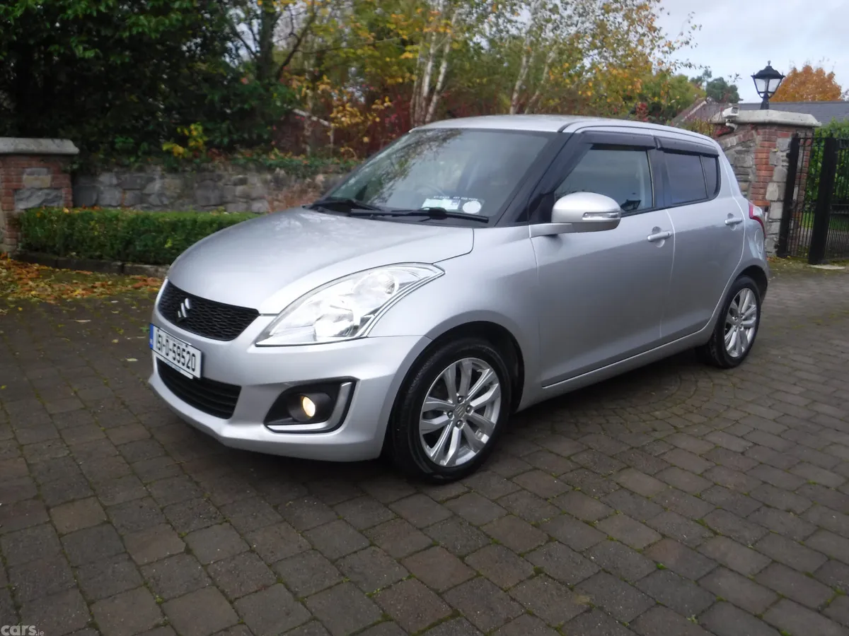 Suzuki Swift Hatchback, Petrol, 2015, Silver