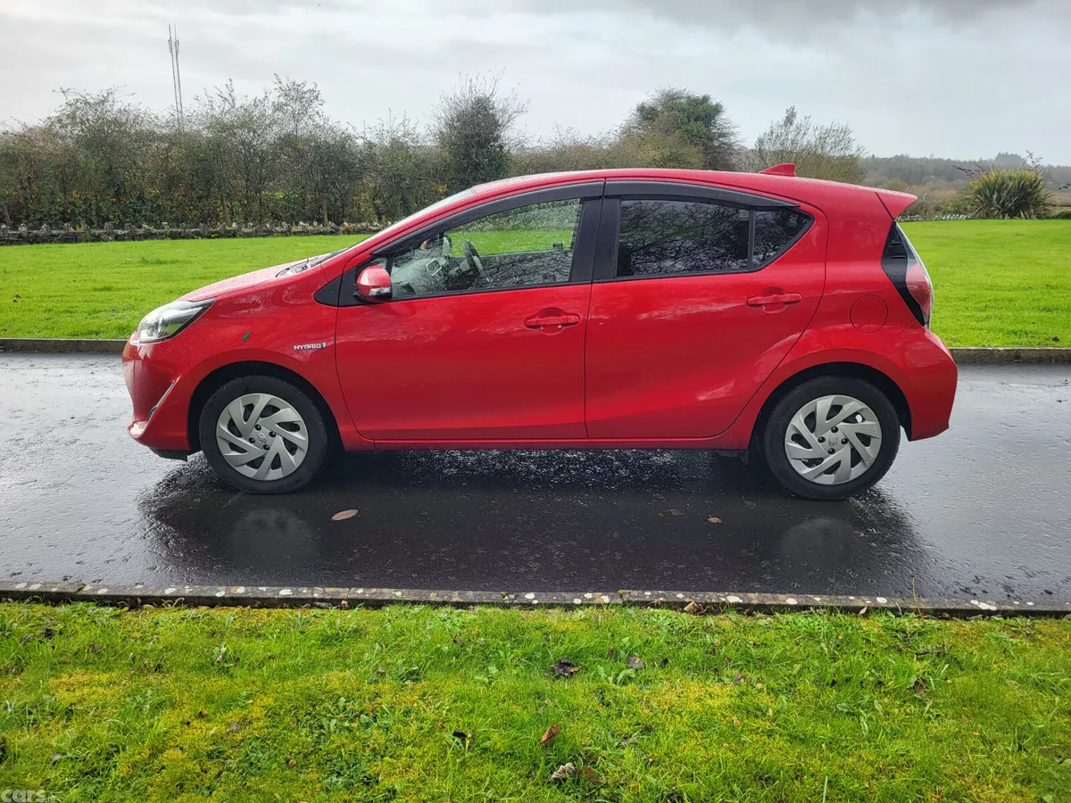 Toyota Aqua Hatchback, Petrol Hybrid, 2017, Red