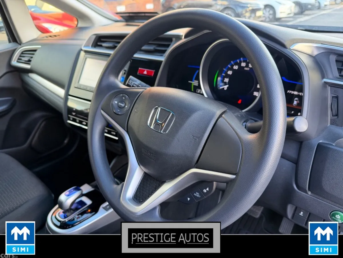 Honda Fit Hatchback, Petrol Hybrid, 2015, Silver